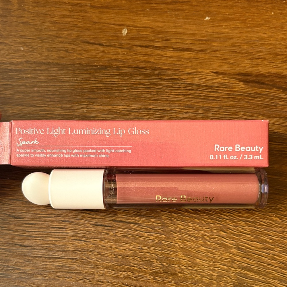 Rare Beauty Positive Light Lip Gloss new with box in Spark